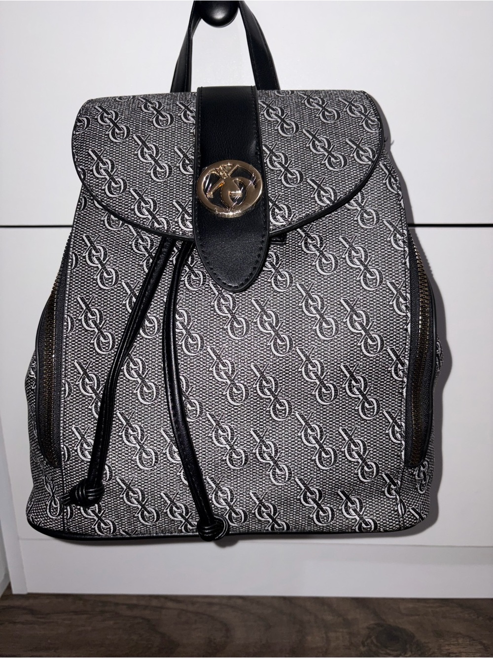 Black & White Monogram Drawstring Backpack with Gold Hardware